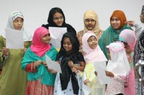 PHOTO ABOVE From left: Salima, Sadia, Salisha, Saffiya, Farah, Sabeha, Sana, Saffiya & Zaria singing a song led by Sis. Sibgha.