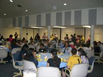 Audience having refreshments, before the program began. There were also questions and answers after the session.