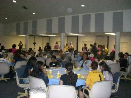 Audience having refreshments, before the program began. There were also questions and answers after the session.